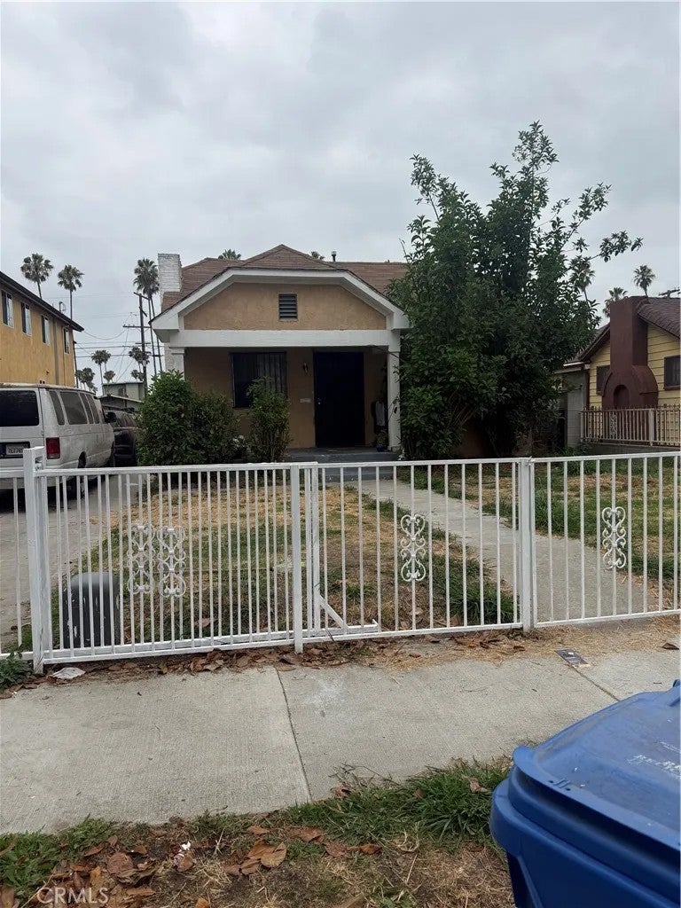 Photo of 5425 S St Andrews PL, Los Angeles, CA 90062 (MLS # PV26144478)