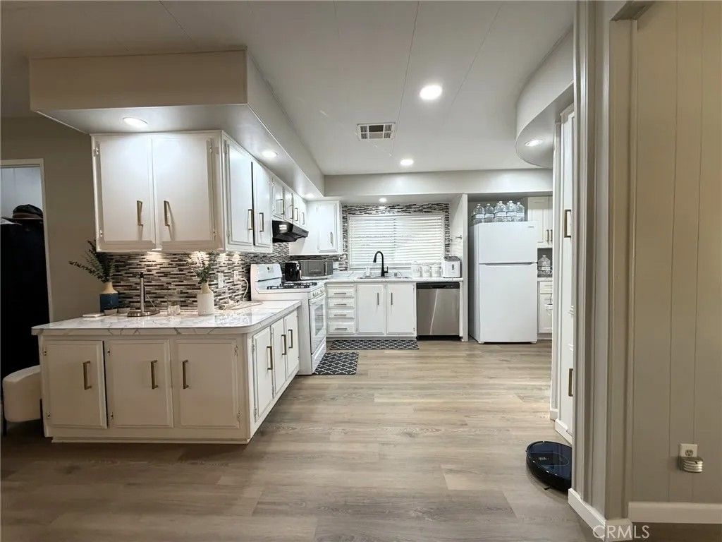 Photo of 26082 Seaforthia Palm Dr, Homeland, CA 92548 (MLS # IV25278979)