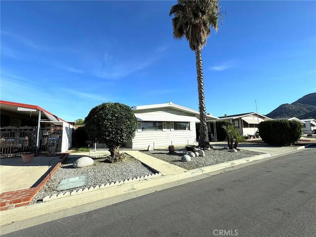 Photo of 26082 Seaforthia Palm Dr, Homeland, CA 92548 (MLS # IV25278979)