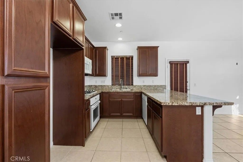 Photo of 665 E. Riverside Dr #3, Ontario, CA 91761 (MLS # CV26014441)