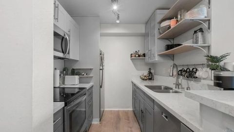 Photo of 6151 Rancho Mission Road #110, San Diego, CA 92108 (MLS # PTP2601030)