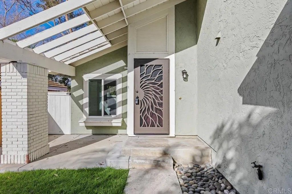 Photo of 7925 Calle Madrid, Carlsbad, CA 92009 (MLS # NDP2600240)