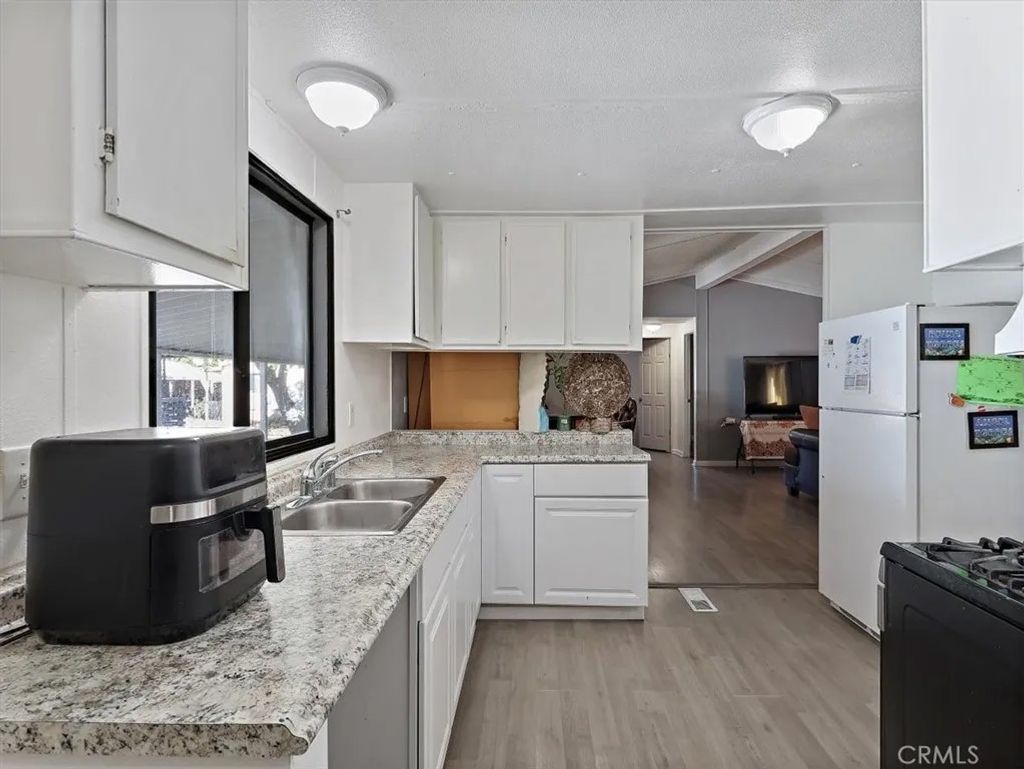 Photo of 3524 E Avenue R #313, Palmdale, CA 93550 (MLS # SR26012944)