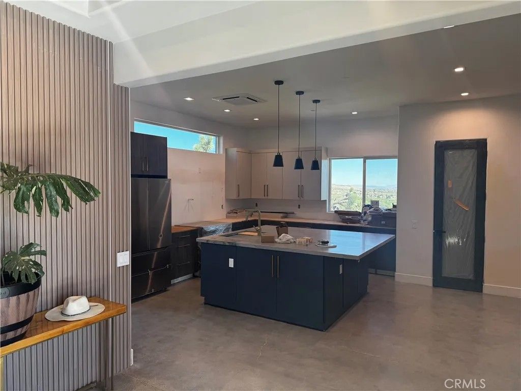 Photo of 54576 Munson Trl, Yucca Valley, CA 92284 (MLS # JT25254826)