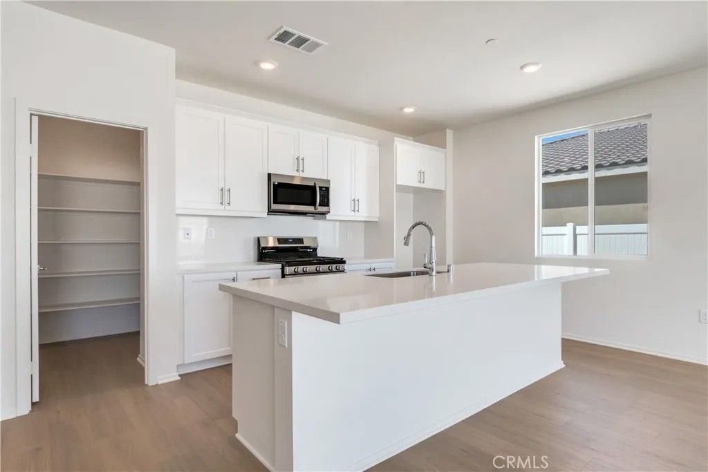 Photo of 1577 E Houlguin Street, Lancaster, CA 93535 (MLS # SR25273373)