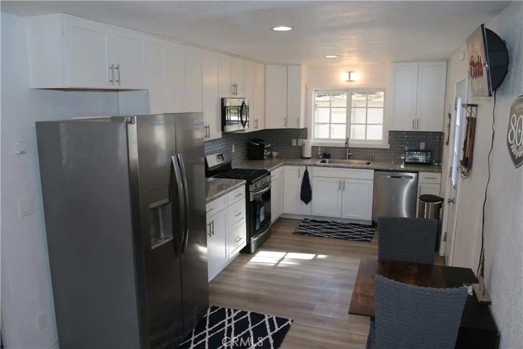 Photo of 509 Moreno Ave, Sugarloaf, CA 92386 (MLS # TR26095677)