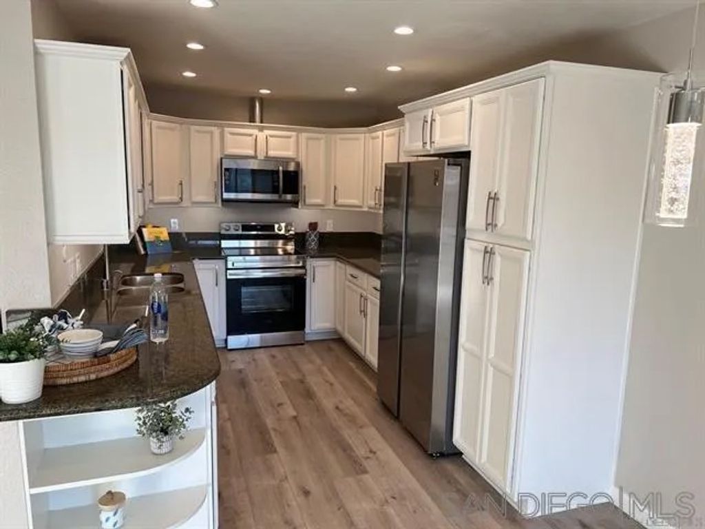 Photo of 10325 Caminito Cuervo #204, San Diego, CA 92108 (MLS # 260005676)