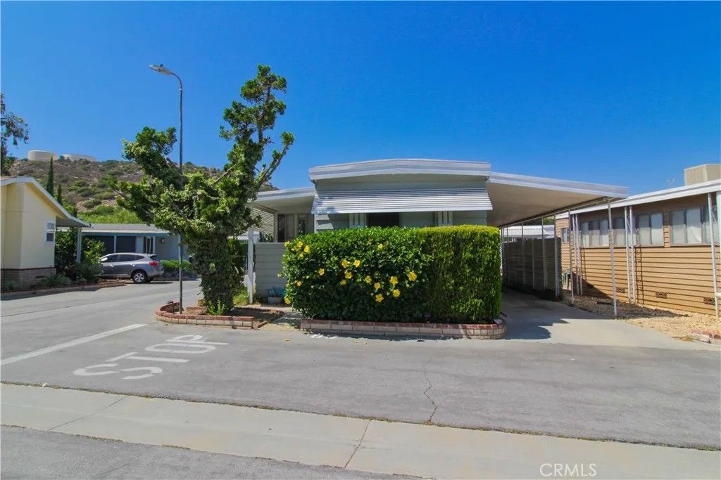 Photo of 11401 Topanga Canyon #80, Chatsworth, CA 91311 (MLS # SR26079251)