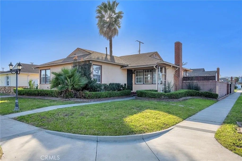 Photo of 12911 Daphne Ave, Gardena, CA 90249 (MLS # SB25280678)