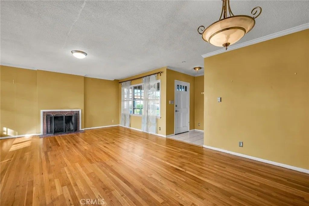 Photo of 12911 Daphne Ave, Gardena, CA 90249 (MLS # SB25280678)