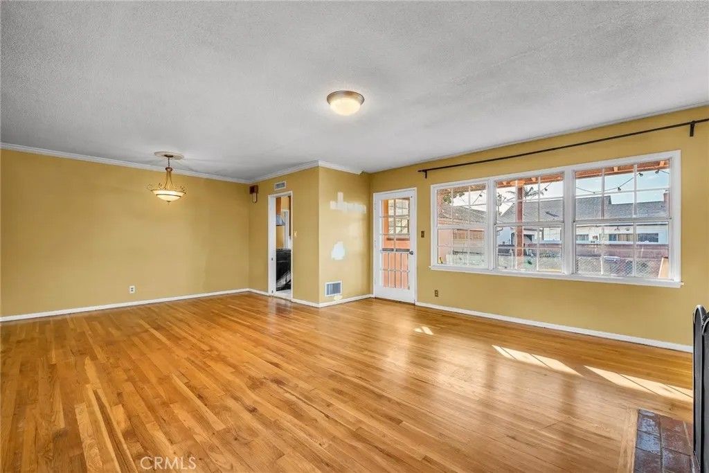 Photo of 12911 Daphne Ave, Gardena, CA 90249 (MLS # SB25280678)