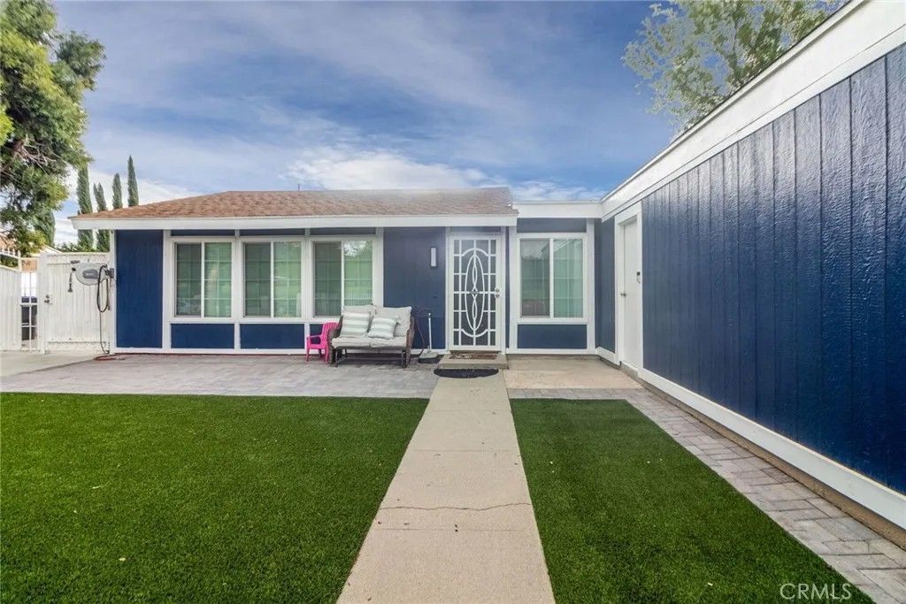 Photo of 5647 Buckboard Drive, San Bernardino, CA 92407 (MLS # IV26079931)