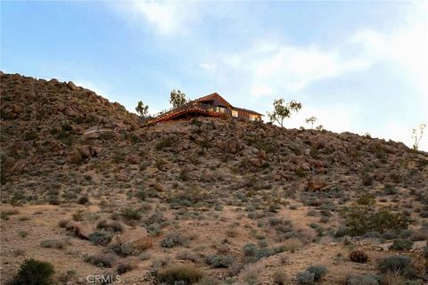 Photo of 71159 Sullivan RD, 29 Palms, CA 92277 (MLS # JT26102595)