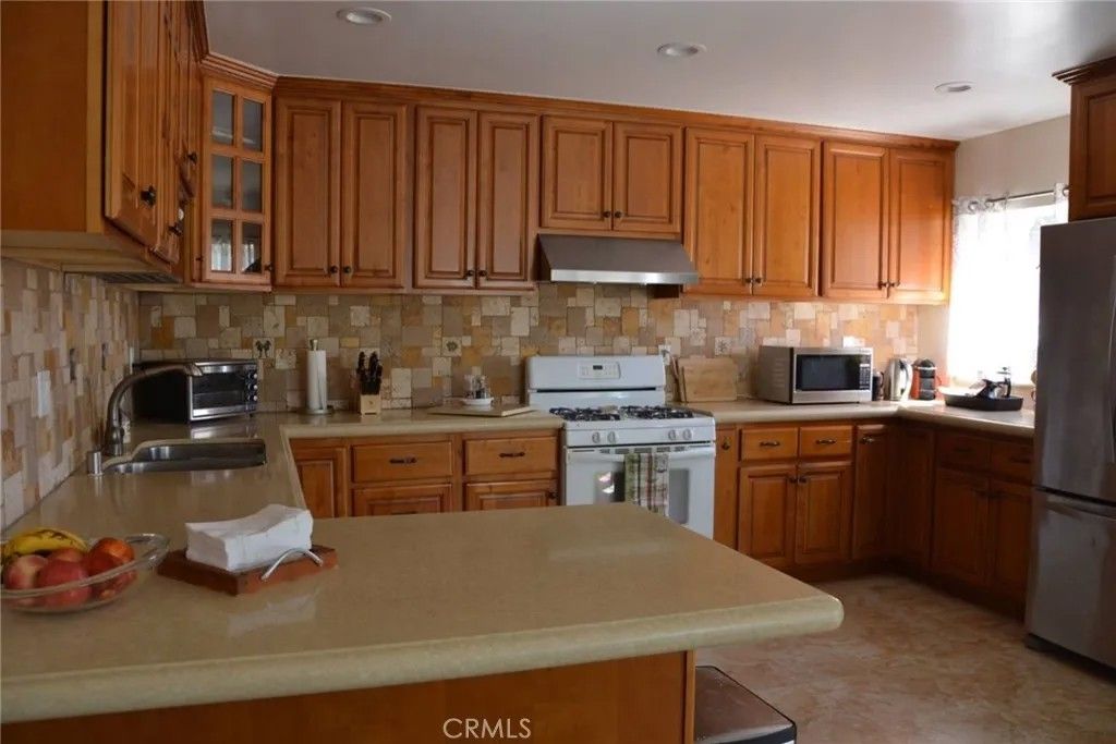 Photo of 22445 Dolorosa, Woodland Hills, CA 91367 (MLS # SR25273325)