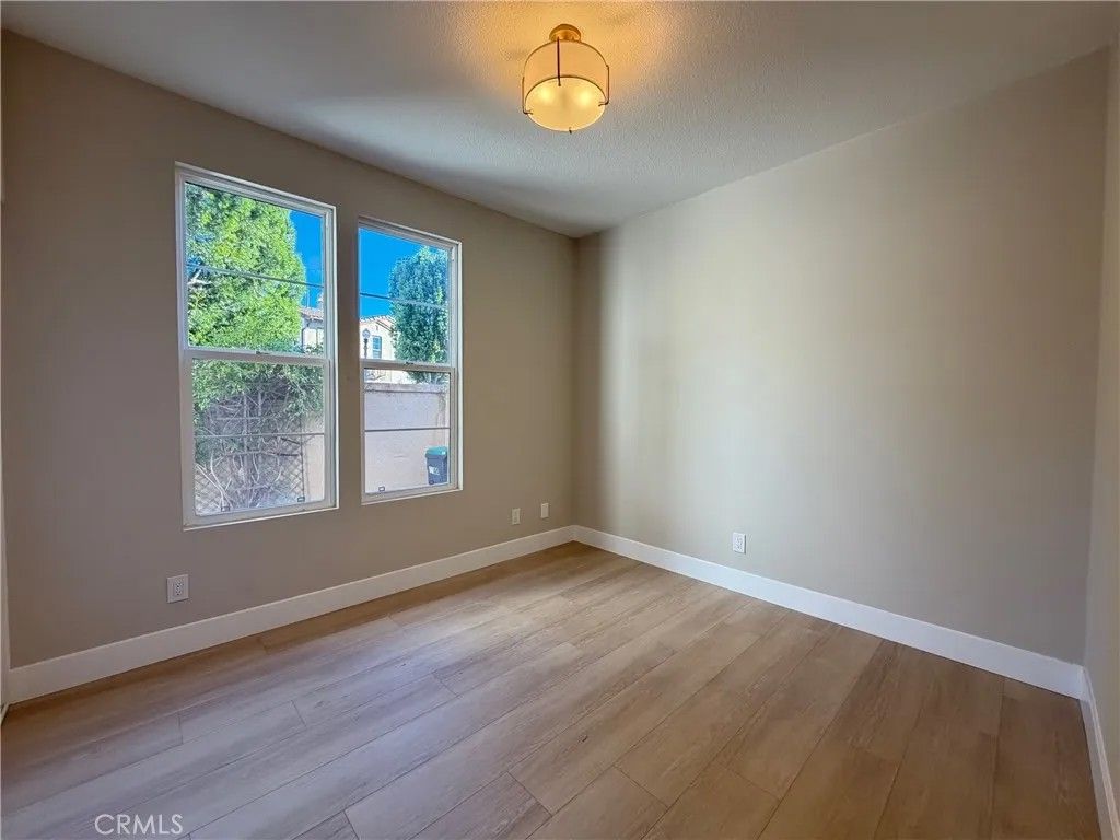 Photo of 302 Tall Oak, Irvine, CA 92603 (MLS # OC26013542)