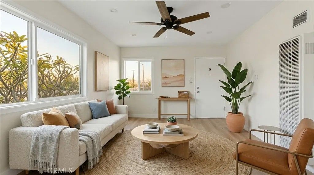 Photo of 3446 Hillcrest Drive, Los Angeles, CA 90016 (MLS # DW26068736)