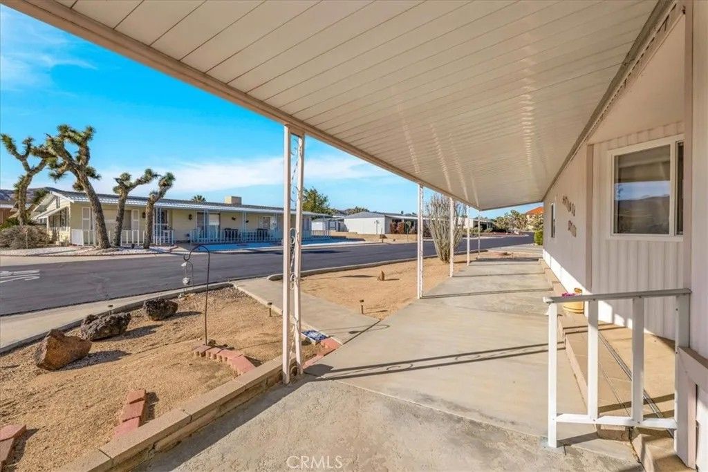 Photo of 7501 Palm Ave #74, Yucca Valley, CA 92284 (MLS # JT26010774)