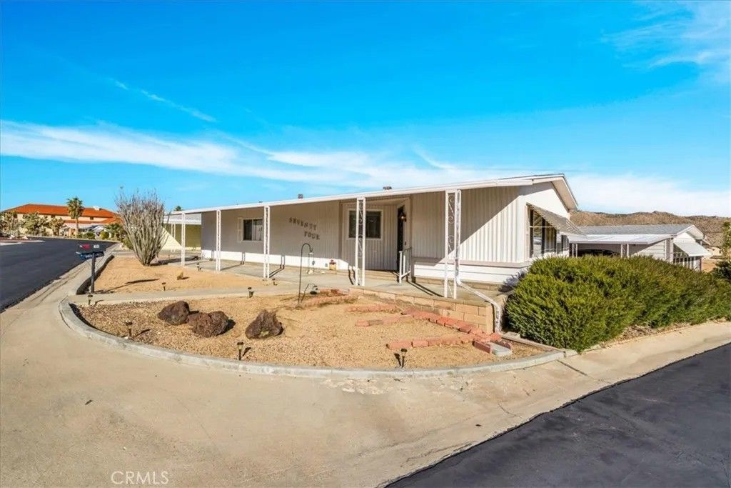 Photo of 7501 Palm Ave #74, Yucca Valley, CA 92284 (MLS # JT26010774)
