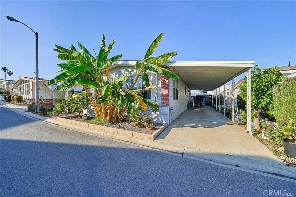 Photo of 2601 E Victoria St #394, Rancho Dominguez, CA 90220 (MLS # SB26071572)