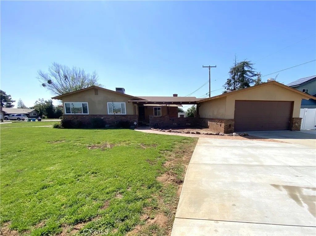 Photo of 106 Myrtlewood Drive, Calimesa, CA 92329 (MLS # IG26005948)