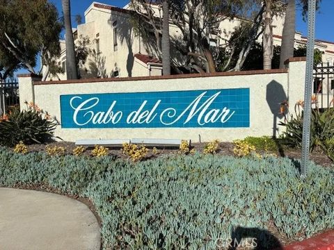 Photo of 5176 Tortuga Dr #107, Huntington Beach, CA 92649 (MLS # OC26032042)