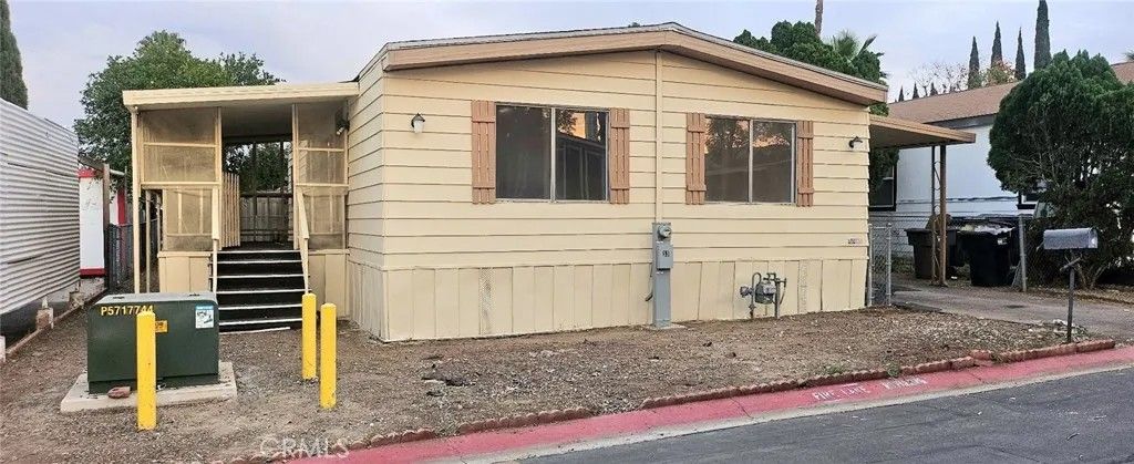 Photo of 995 Pomona Rd #33, Corona, CA 92882 (MLS # IV26012682)