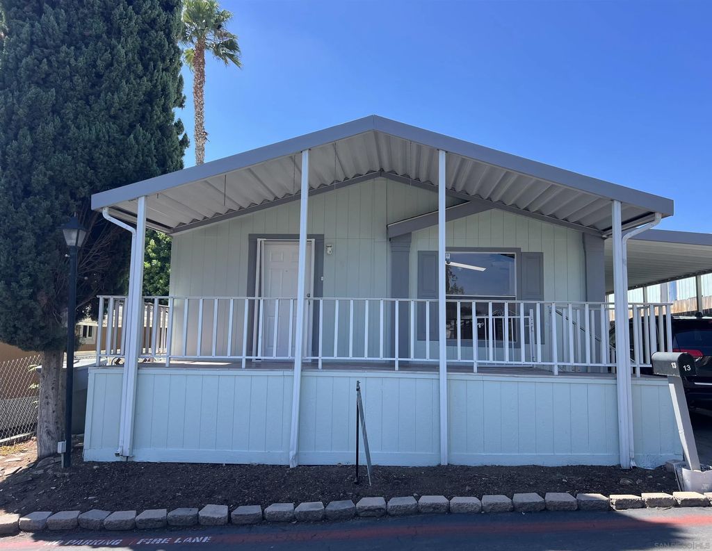 Photo of 9902 Jamacha Blvd #13, Spring Valley, CA 91977 (MLS # 250039452)
