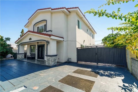 Photo of 12122 207th ST, Lakewood, CA 90715 (MLS # PW26220215)
