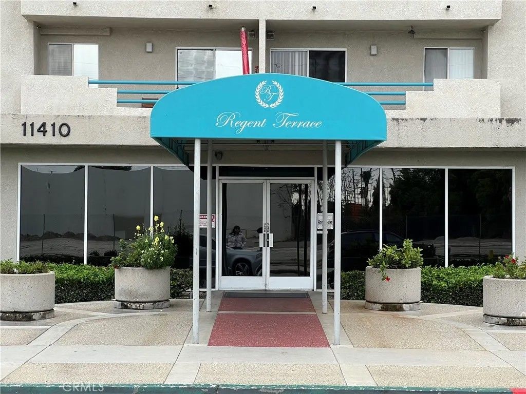 Photo of 11410 Dolan Avenue #315, Downey, CA 90241 (MLS # RS26000361)