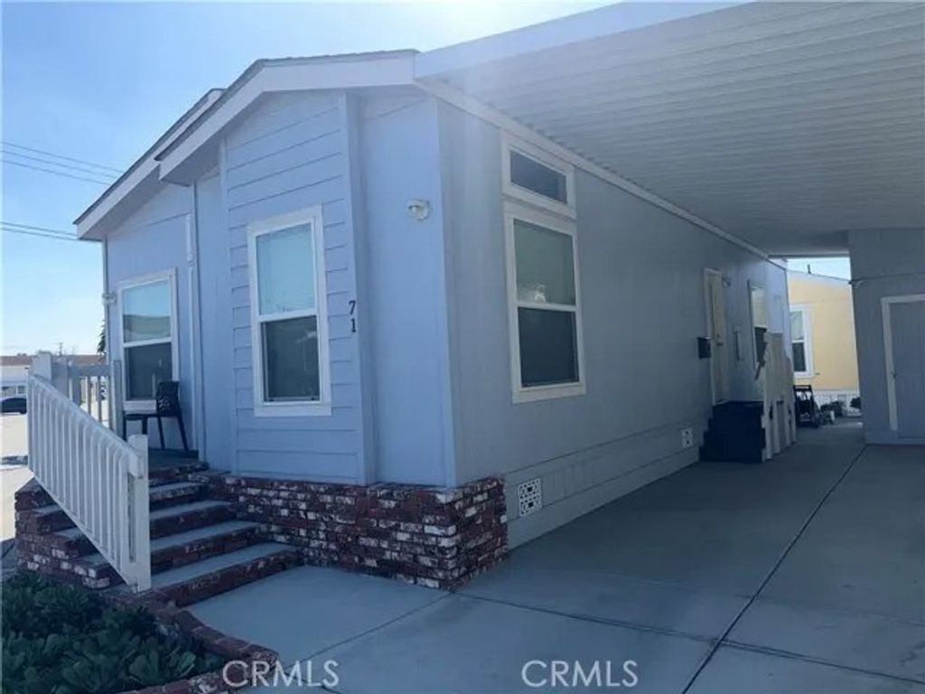 Photo of 12737 Rosecrans Ave #71, Norwalk, CA 90650 (MLS # PW26064248)
