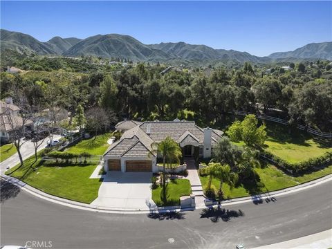 Photo of 15629 Bronco Drive, Canyon Country, CA 91387 (MLS # SR26055545)