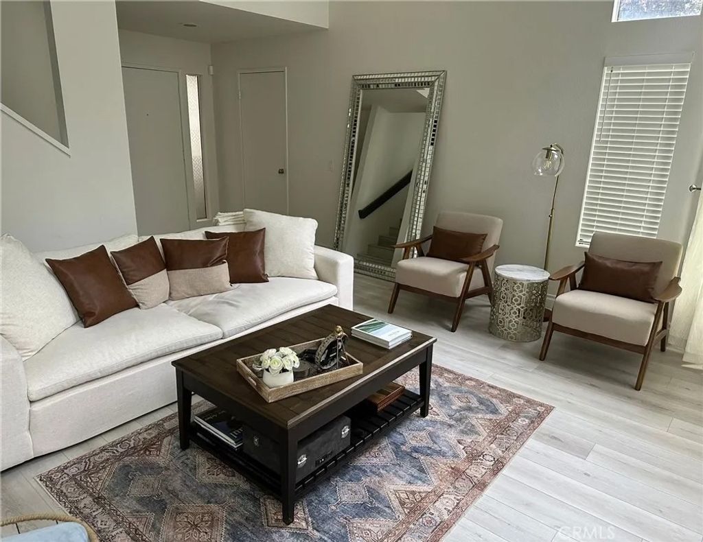 Photo of 166 N Singingwood St #15, Orange, CA 92869 (MLS # GD25267866)