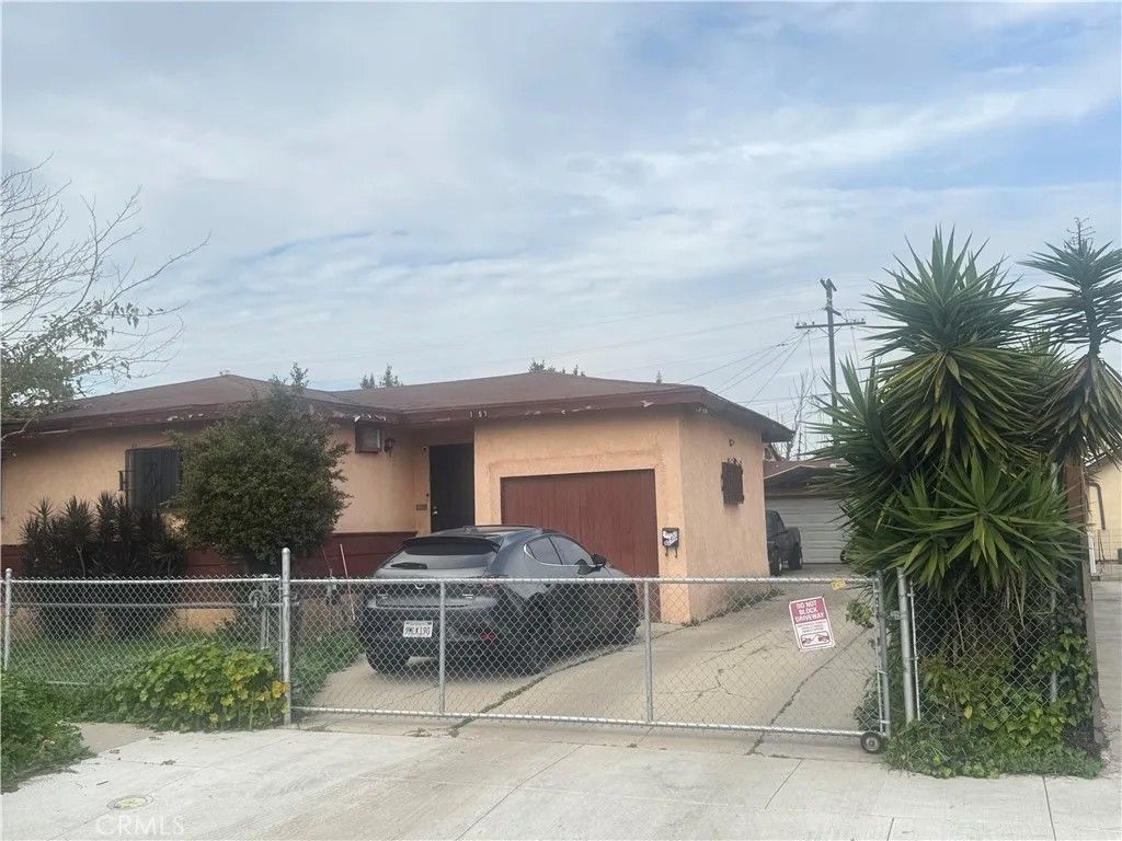 Photo of 1155 W 104th St, Los Angeles, CA 90044 (MLS # IN26016194)