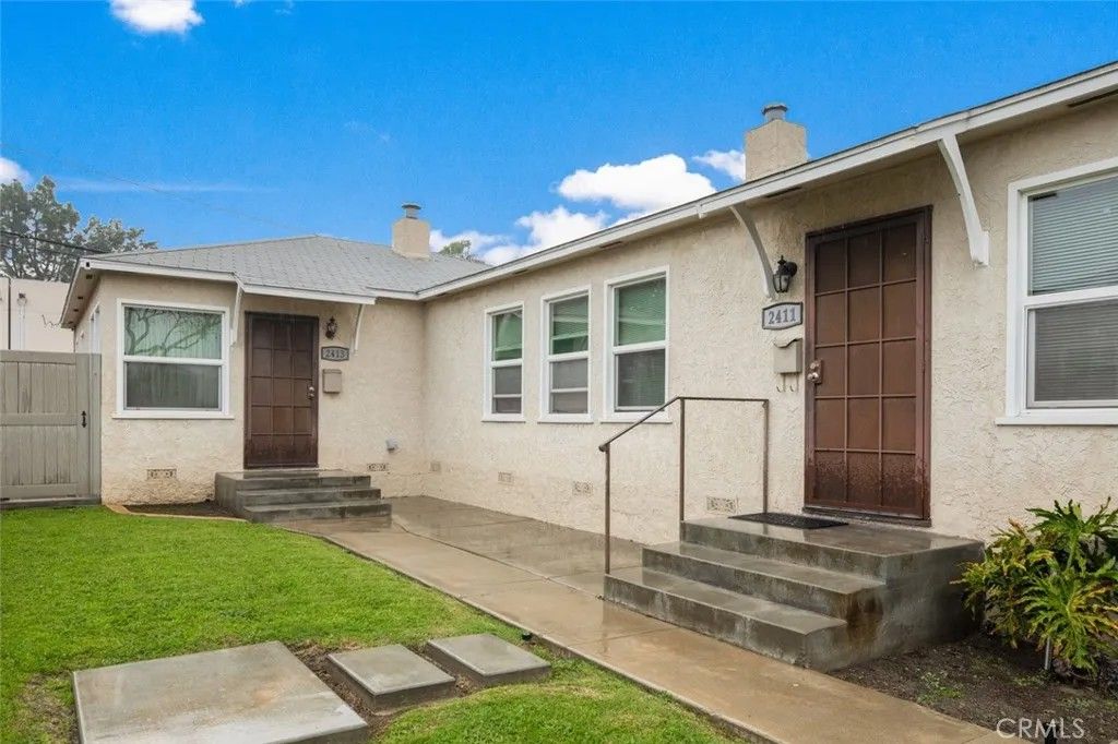 Photo of 2411 Termino Ave, Long Beach, CA 90815 (MLS # OC26017606)