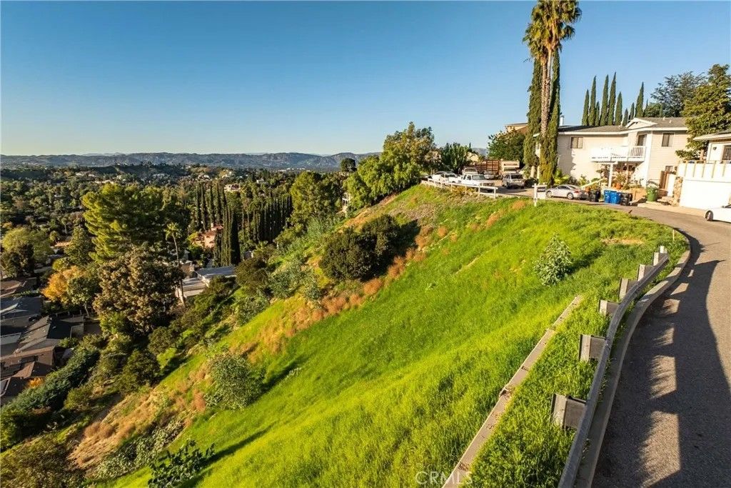 Photo of 32 San Blas, Woodland Hills, CA 91364 (MLS # SR25276282)