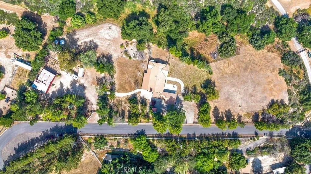 Photo of 26615 Mountain Park Road, Canyon Country, CA 91387 (MLS # SR26076933)