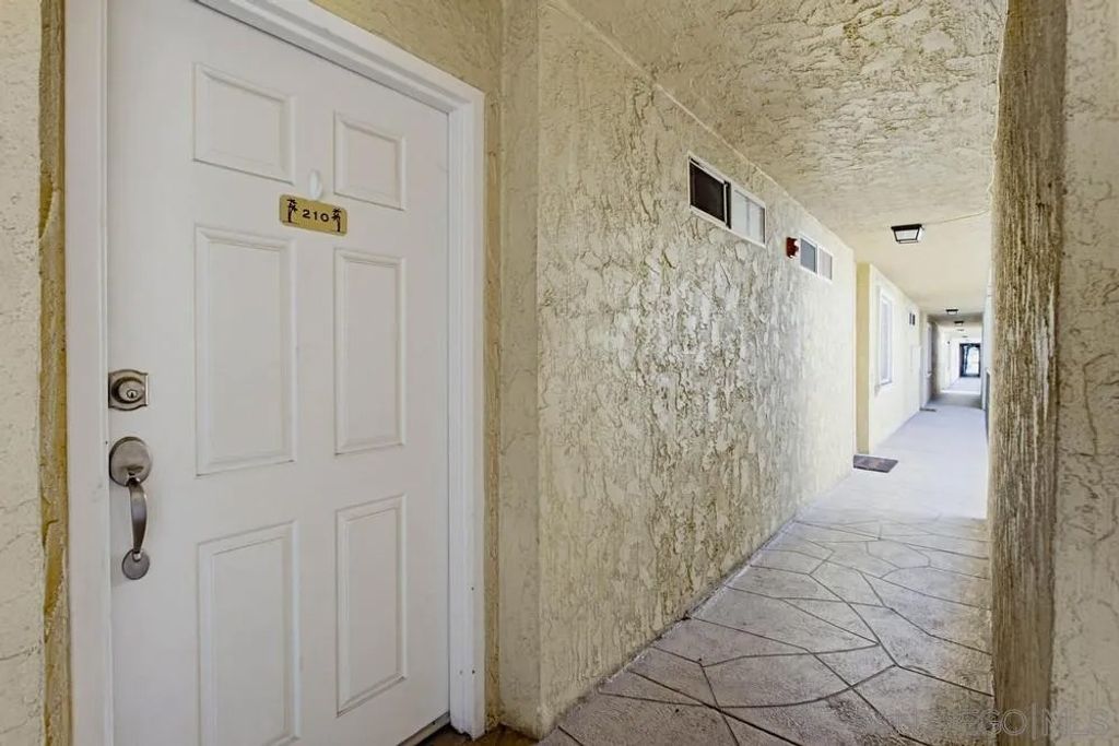 Photo of 5055 Collwood Blvd #210, San Diego, CA 92115 (MLS # 260005494)