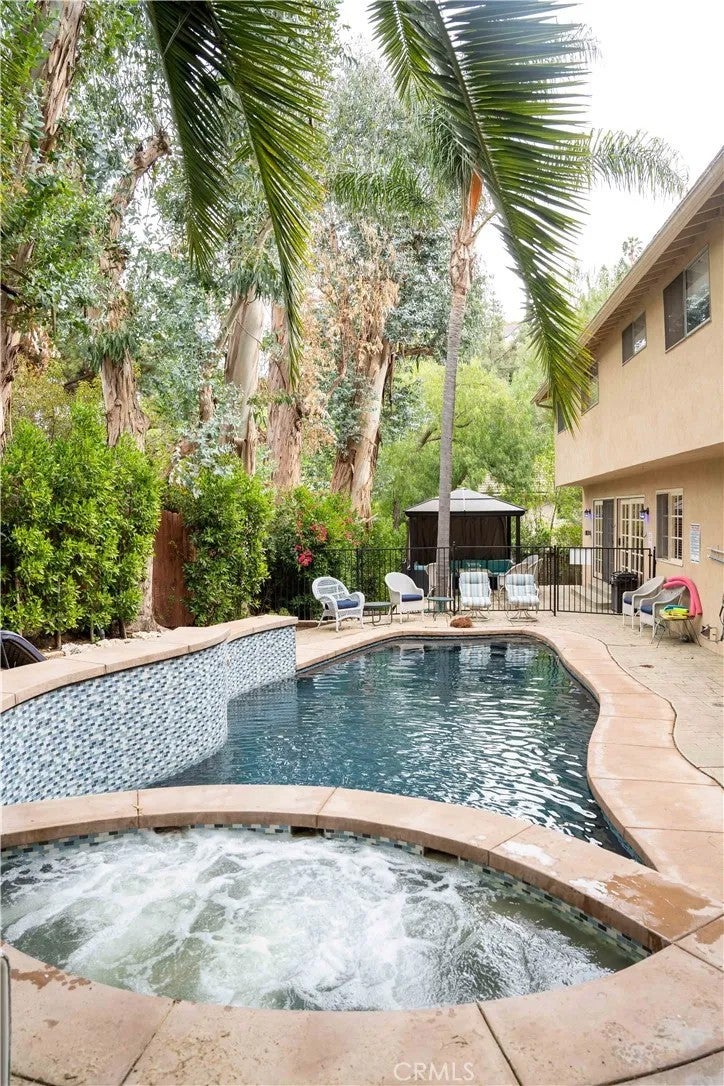 Photo of 7703 Skyhill Drive, Hollywood Hills, CA 90068 (MLS # SR26211904)
