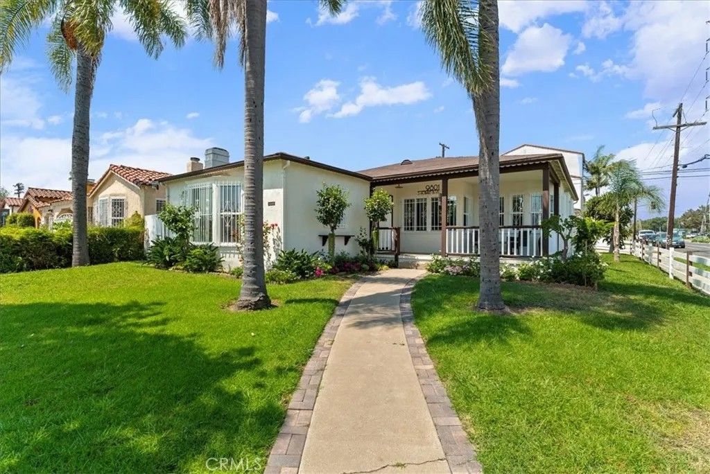 Photo of 9801 S Hobart Boulevard, Los Angeles, CA 90047 (MLS # OC26047306)