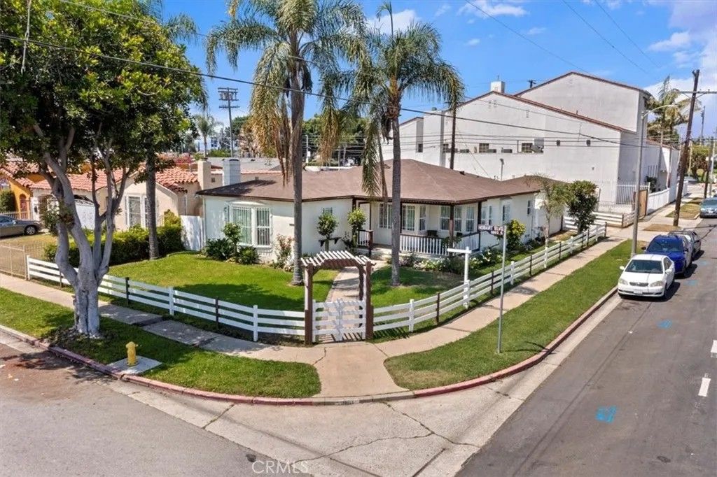 Photo of 9801 S Hobart Boulevard, Los Angeles, CA 90047 (MLS # OC26047306)