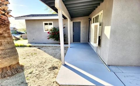 Photo of 65786 Sixth St, Desert Hot Springs, CA 92240 (MLS # IV26032065)