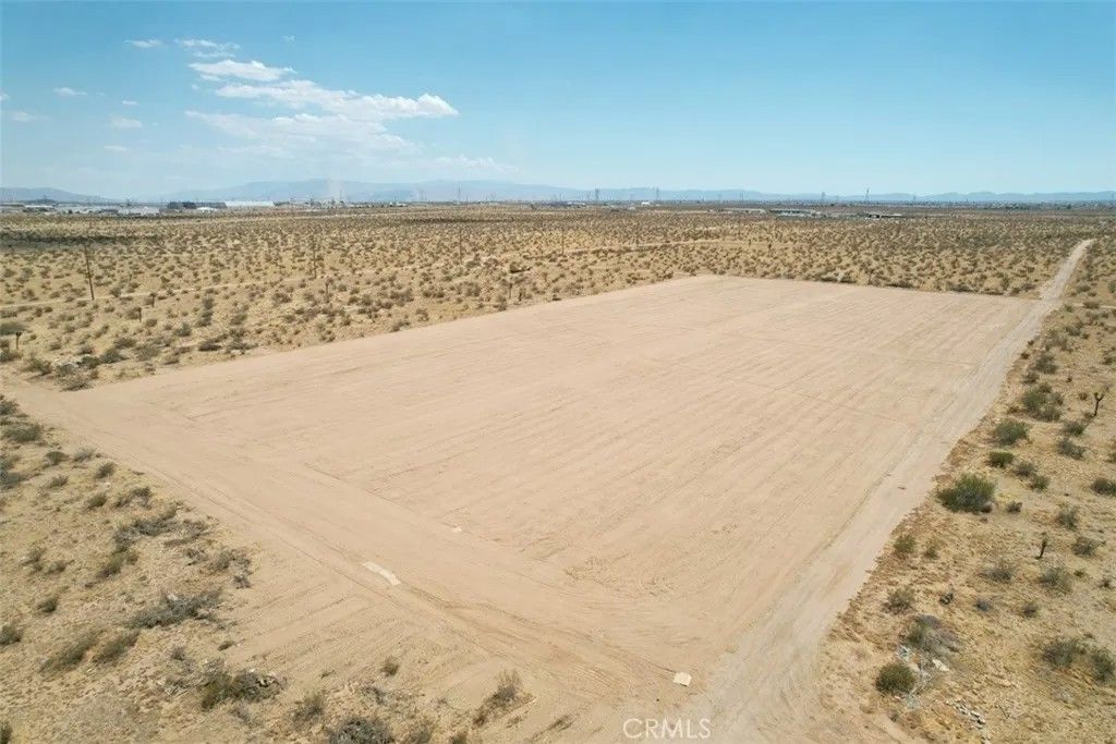 Photo of 21 Palm Ave, Adelanto, CA 92301 (MLS # CV26081512)