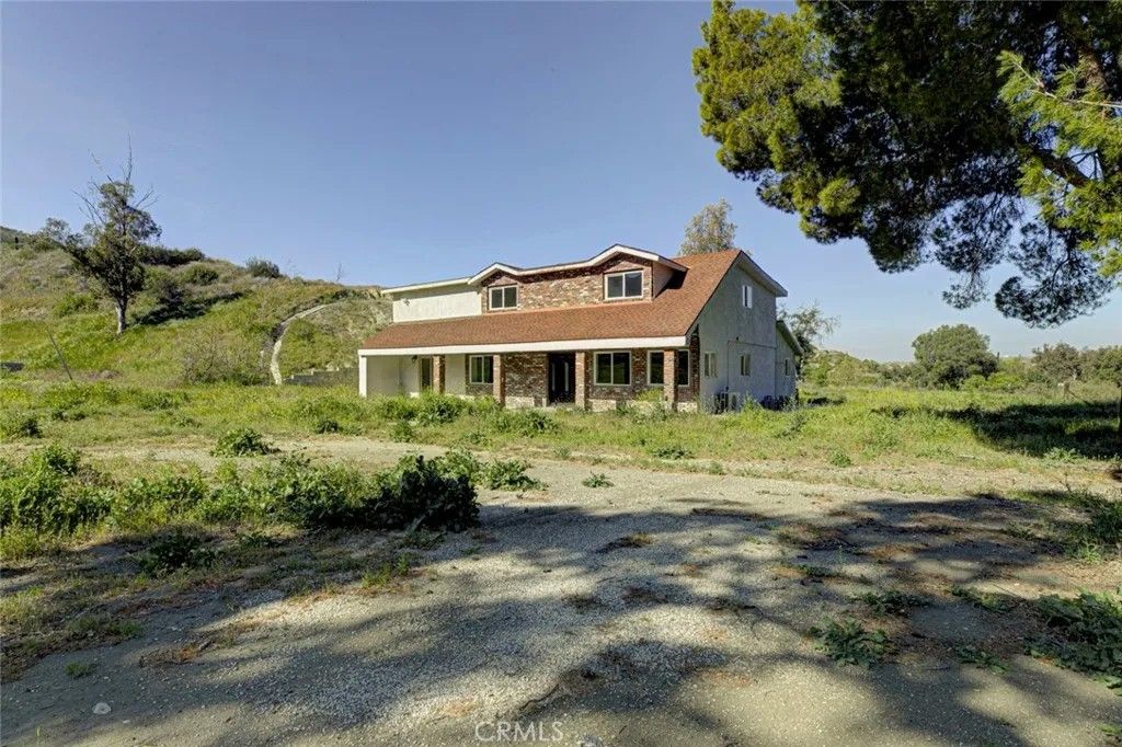 Photo of 27506 Oak Spring Canyon Road, Canyon Country, CA 91387 (MLS # GD26049097)