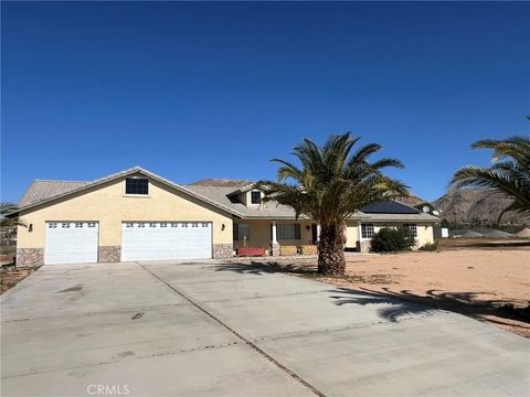 Photo of 24030 Cahuilla Rd, Apple Valley, CA 92307 (MLS # CV26025459)