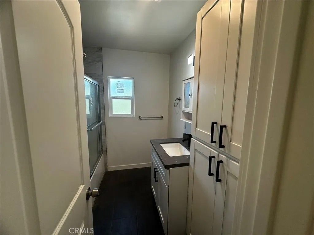 Photo of 1525 W 105th Street, Los Angeles, CA 90047 (MLS # GD26001784)