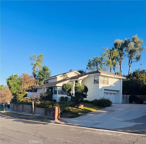 Photo of 19235 Dunure Place, Porter Ranch, CA 91326 (MLS # SR26198917)