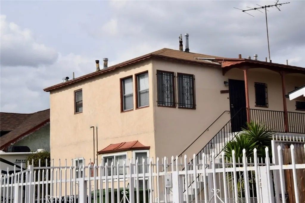 Photo of 1945 W Vernon Ave, Los Angeles, CA 90062 (MLS # PW26045448)