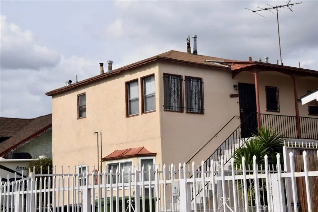 Photo of 1945 W Vernon Ave, Los Angeles, CA 90062 (MLS # PW26045448)