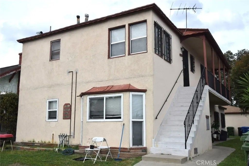 Photo of 1945 W Vernon Ave, Los Angeles, CA 90062 (MLS # PW26045448)