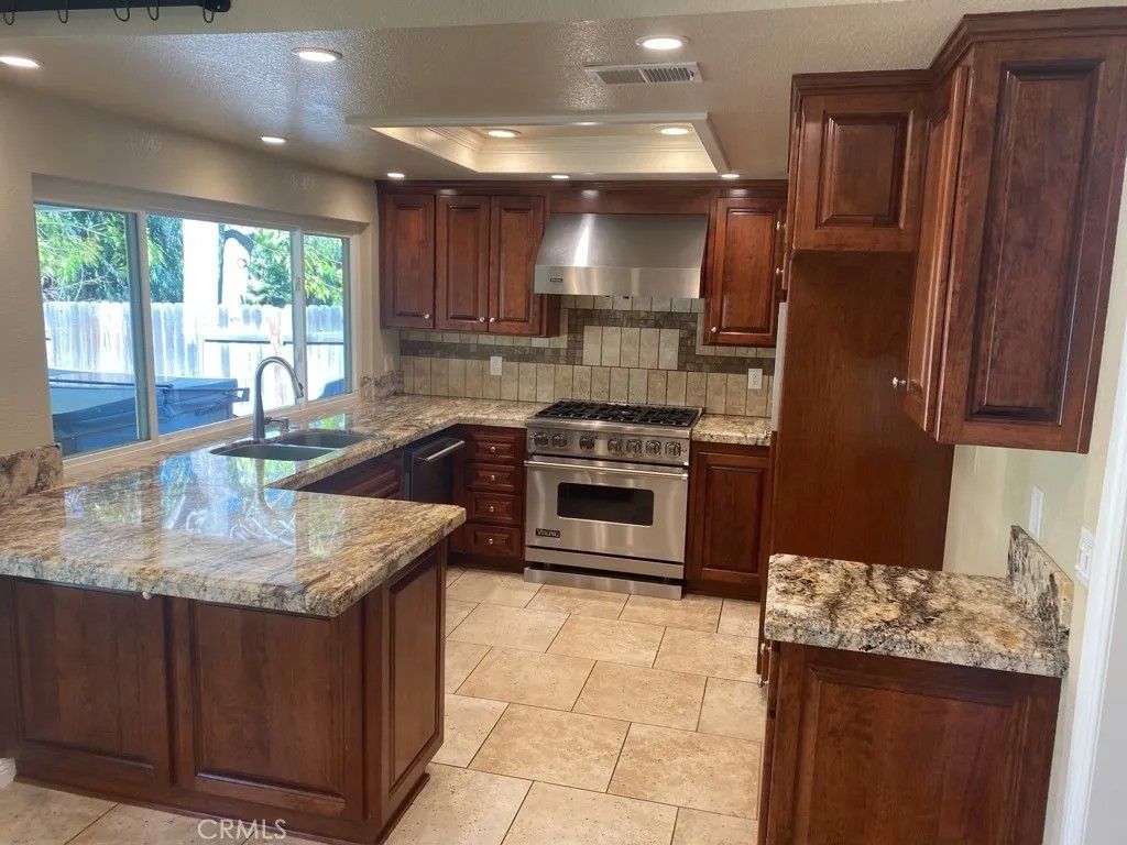 Photo of 6055 Saint Augustine Dr, Riverside, CA 92506 (MLS # IV26035434)